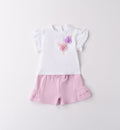 Completo bambina in cotone con t-shirt bianca e shorts rosa con balze.