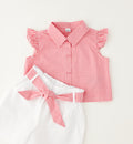 dettaglio completo bambina con cintura vichy rosa