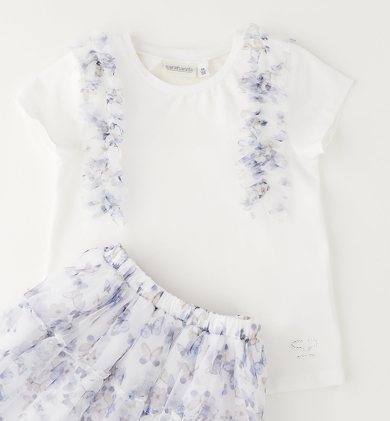 completo bambina maglia bianca e gonna fantasia