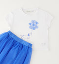 Completo bambina con maglia bianca stampa cagnolino e gonna in tulle blu vaporoso.