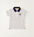 Completo bambino con polo fantasia in cotone e bermuda color sabbia stile casual chic.