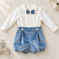Completo battesimo bimbo azzurro polvere e bianco con camicia ricamata, pantaloncino a palloncino in velluto e papillon coordinato.