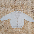 Completo con pantaloni a quadretti azzurri e beige