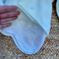 Completo battesimo bimbo azzurro e avorio con cardigan doppiopetto, pantalone con bretelle e papillon