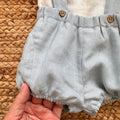Coulotte celeste con elastico alle gambe e bretelle applicate