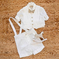 completo battesimo bimbo panna con gilet e salopette elegante