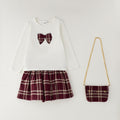 Completo bimba 3 pezzi con maglia bianca, gonna tartan bordeaux e borsetta coordinata