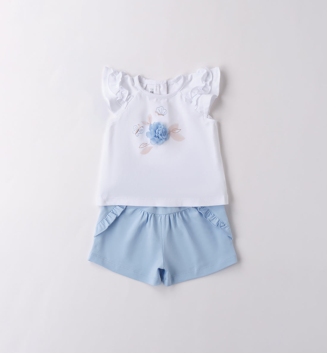  Completo bianco e azzurro per bambina 6-24 mesi, vista frontale.