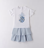 Completo bambina con t-shirt bianca ananas glitter e gonna azzurra a balze.