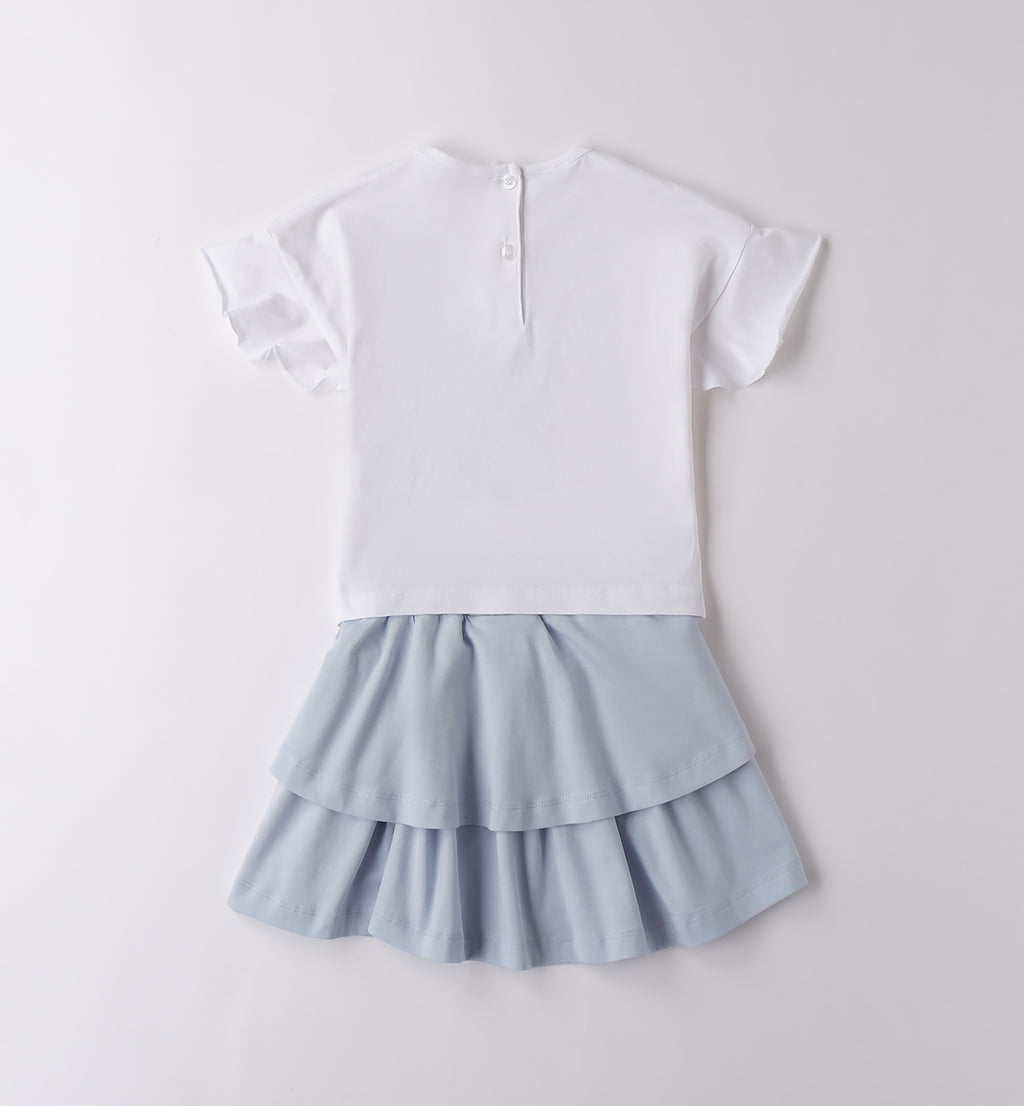 Retro completo bimba: t-shirt con apertura a bottoncino e gonna a doppia balza.