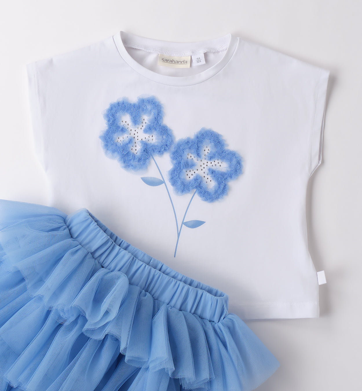 Completo bimba con t-shirt floreale e gonna in tulle azzurro
