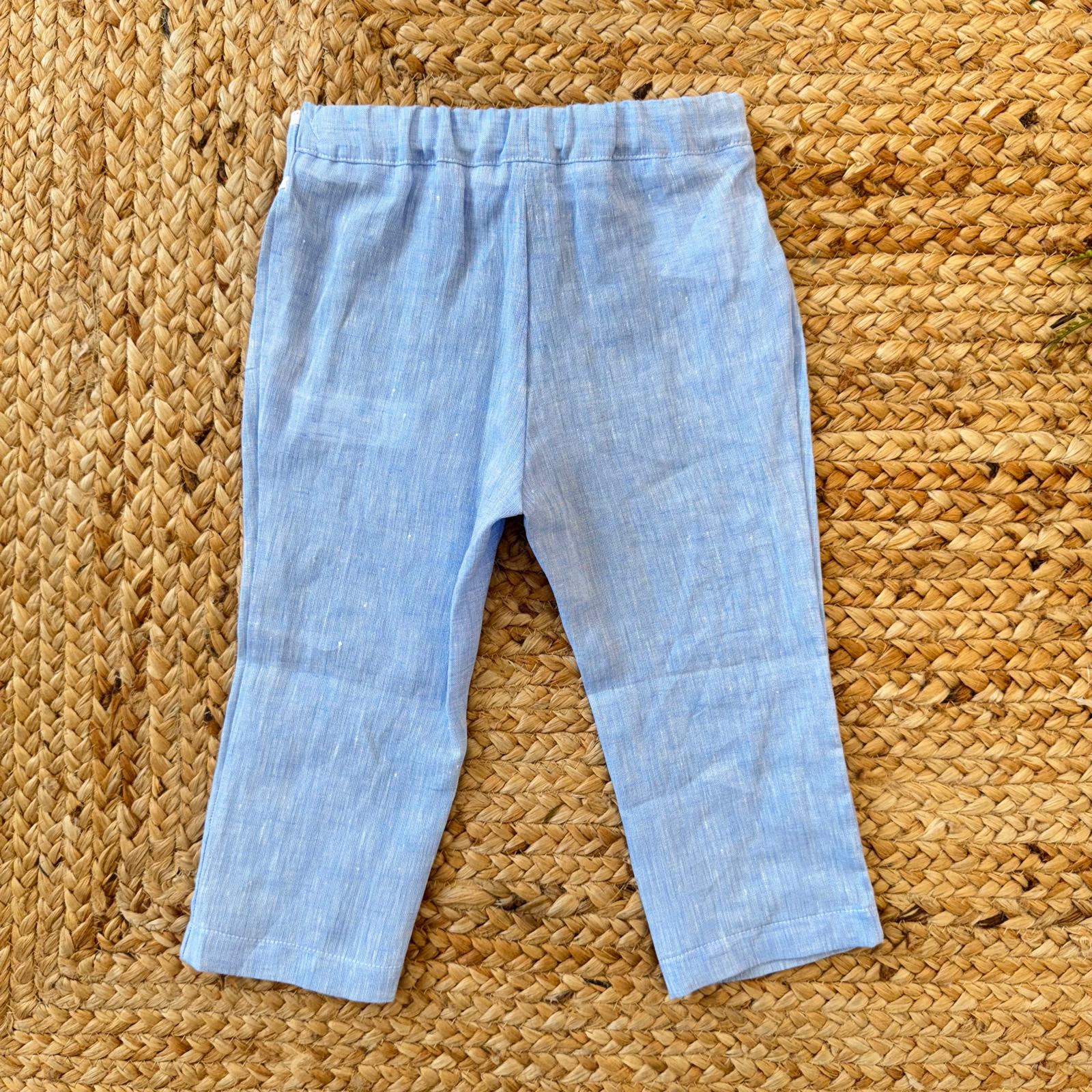 Pantalone bimba in lino con fiocco decorativo in vita.