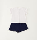 Retro completo bimba con chiusura a bottoni e shorts blu con ruches