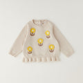 Maglioncino bimba beige in cotone e lana con fiori gialli applicati e volant