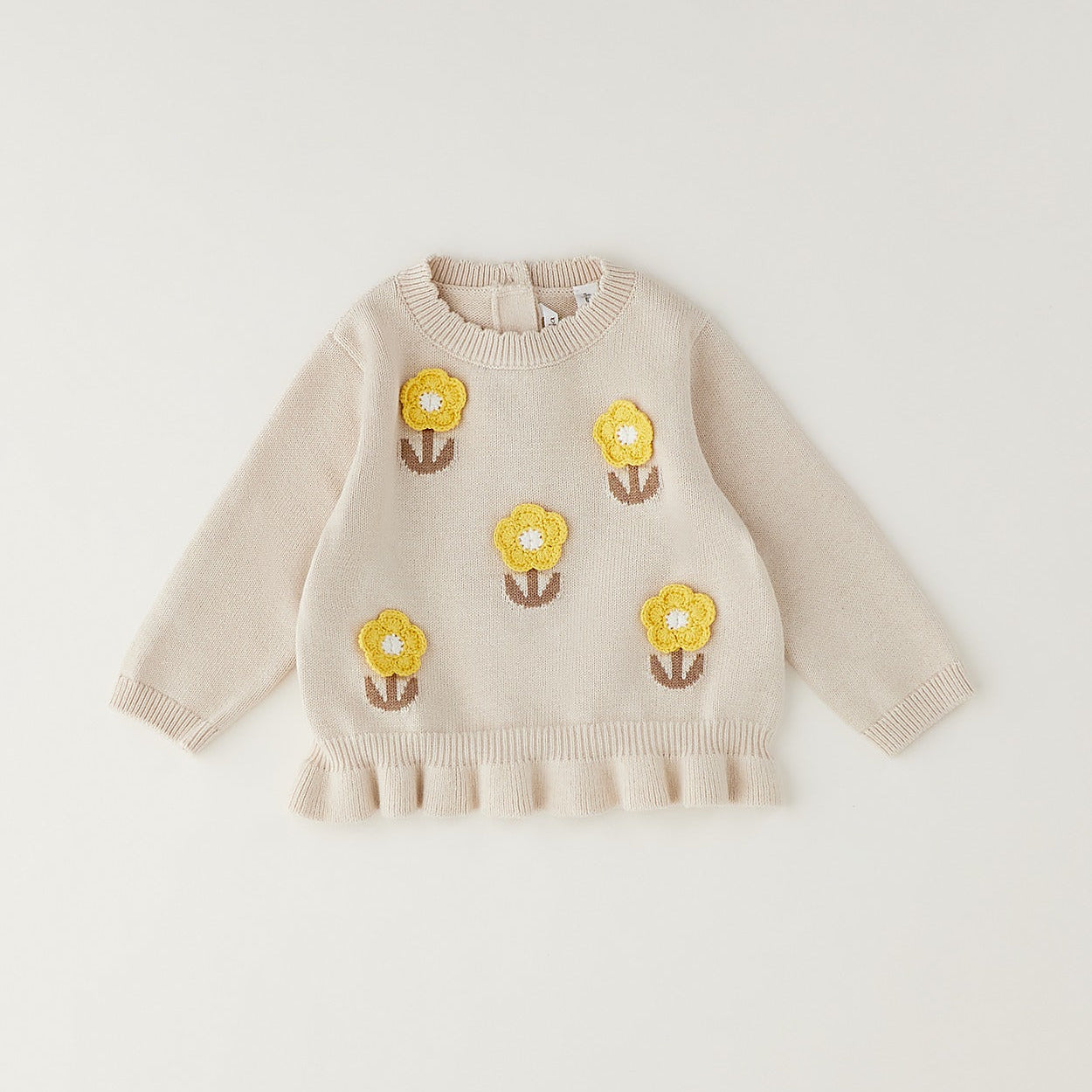 Maglioncino bimba beige in cotone e lana con fiori gialli applicati e volant