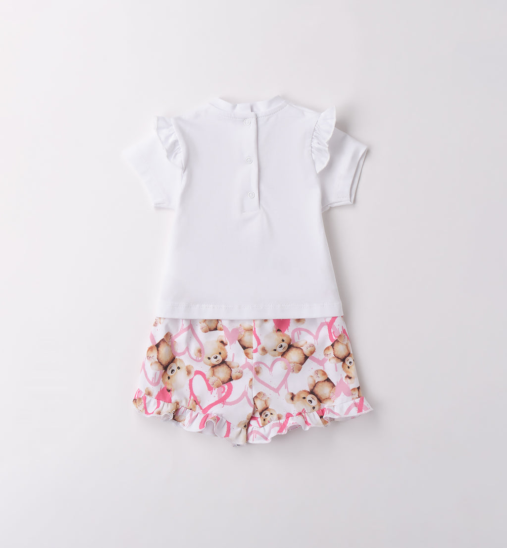  Retro completo bimba con maglietta a bottoncini e pantaloncini stampati con balze.

