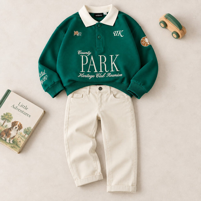 Completo bimbo con polo verde ricamata e pantalone panna