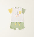 Completo bimbo con t-shirt bianca stampa animaletti e shorts verde salvia