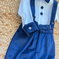 Papillon in velluto blu e camicia bianca del completo battesimo bimbo.