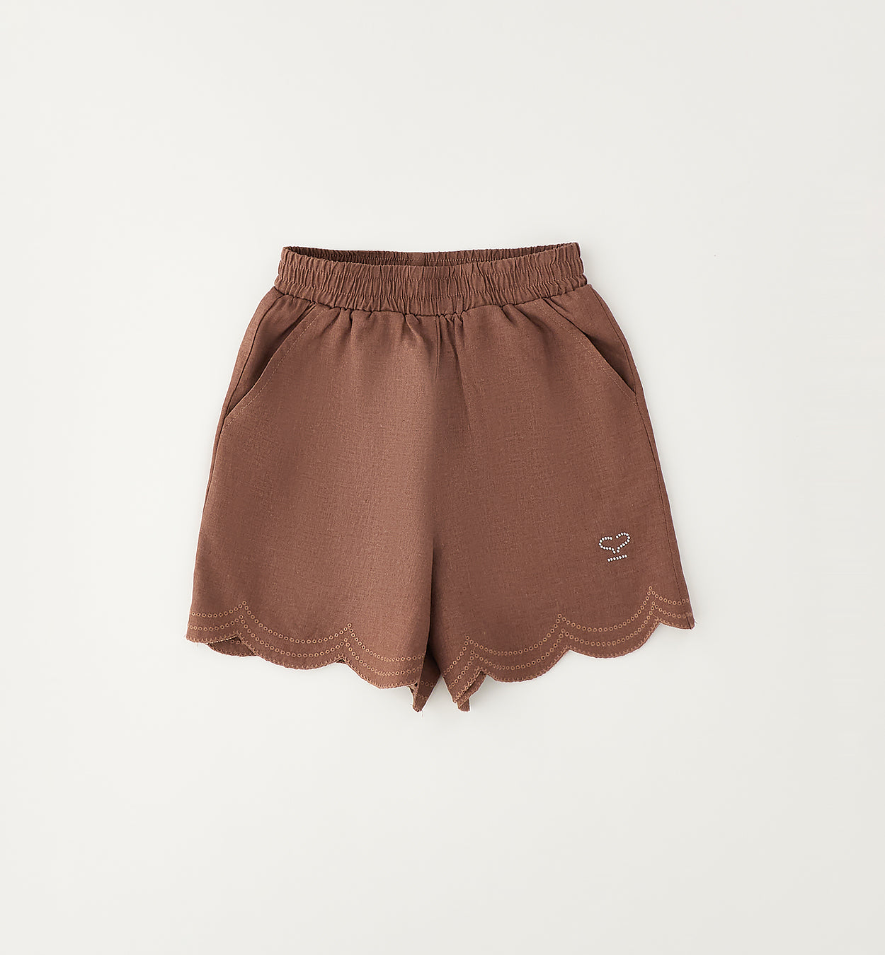 completo bambina chic con volant e dettagli ricamati