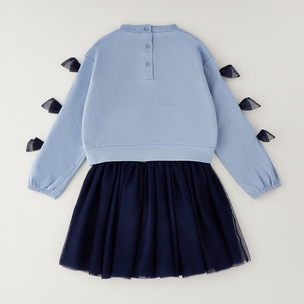 Completo bimba azzurro e blu con maglia con fiocchi e gonna in tulle