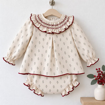 Vestitino neonata panna con fantasia floreale e colletto volant bordeaux
