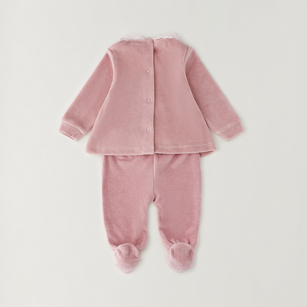 Completo neonata in ciniglia rosa con coniglietto, colletto bianco e pantalone con piedini per corredino nascita.
