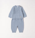 Dettaglio maglia neonato 100% cotone motivo rombi