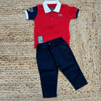 completo sportivo neonato polo rossa e pantalone navy