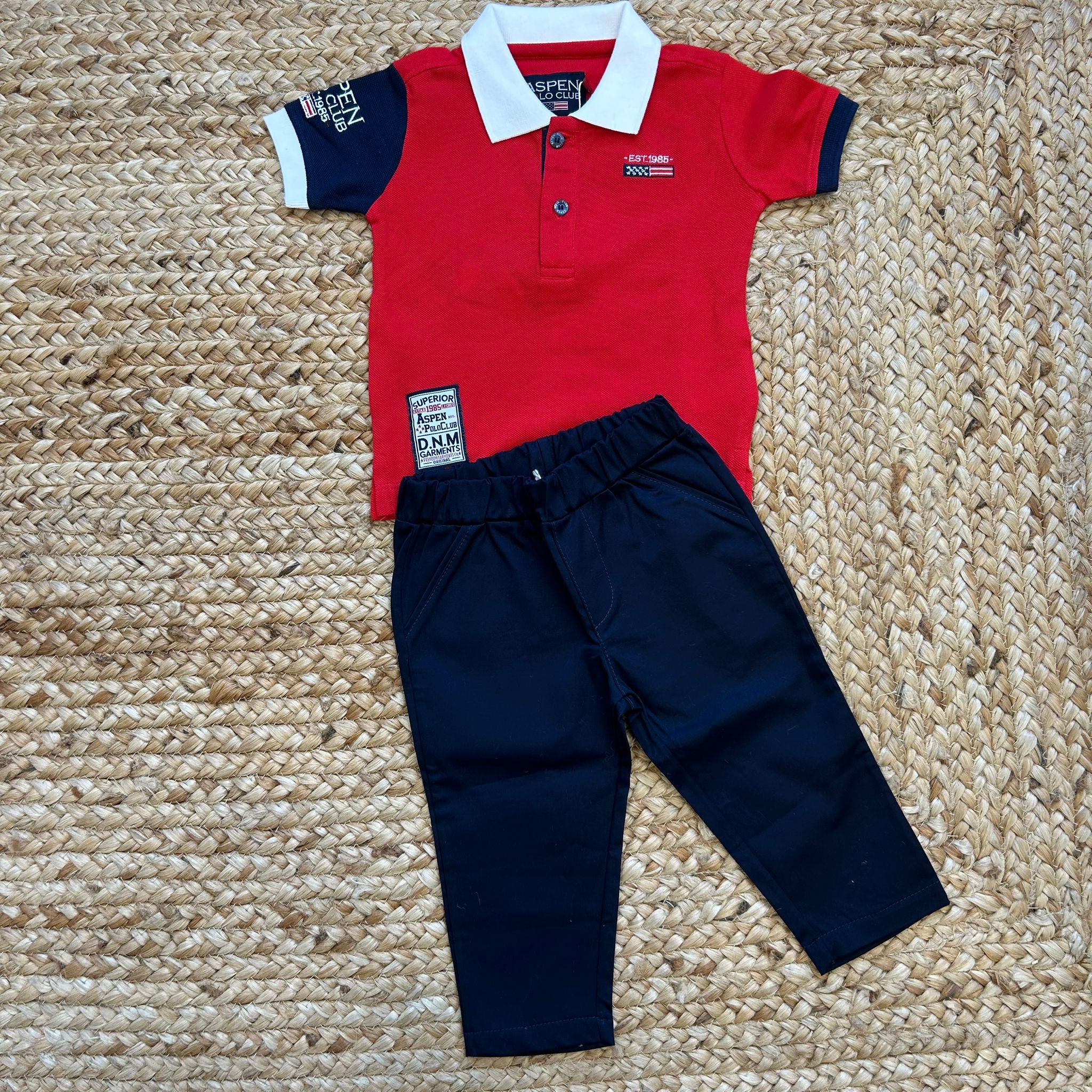 completo sportivo neonato polo rossa e pantalone navy