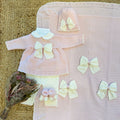 coordinato completo neonata lana rosa con fiocchi panna