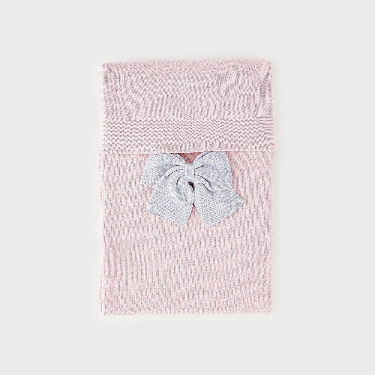 Copertina neonata rosa e grigio in 80% cotone e 20% lana con grande fiocco. Elegante per corredino nascita, set nascita e regalo per bambina.
