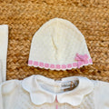 Uscita clinica neonata panna e rosa con maxi fiocchi, copertina, completo e accessori coordinati