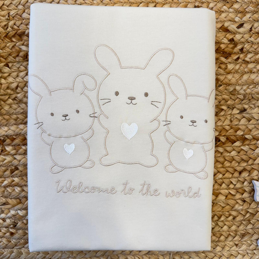 Copertina neonato/a in 100% cotone beige con ricamo coniglietti