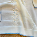 Uscita clinica neonato in lana merino panna e azzurro con copertina e completo coordinato