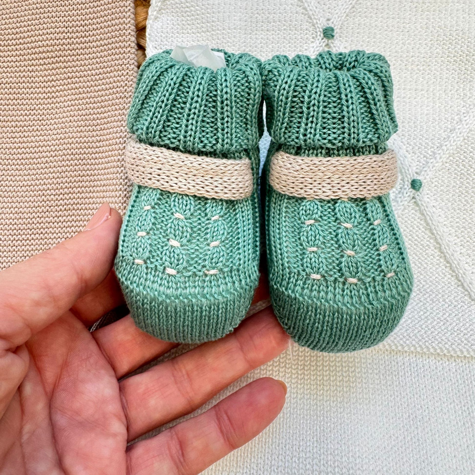 copertina neonato verde e panna lavorazione rombi