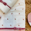 Uscita clinica neonata in ciniglia rosa con copertina sfoderabile e completo lenzuola.