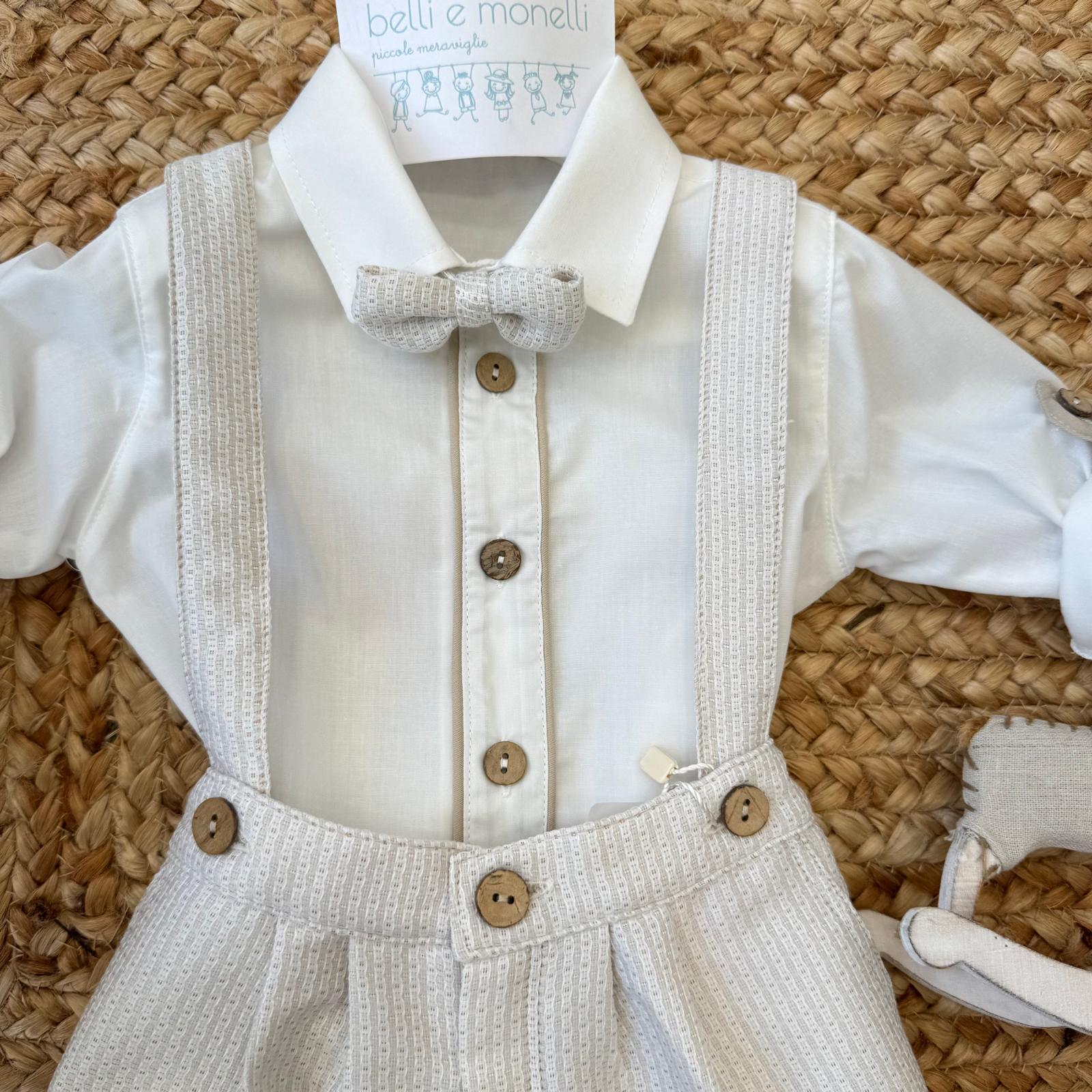 dettaglio manica regolabile con bottone