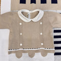 Coprifasce neonato beige in maglia con colletto bianco