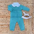 Coprifasce verde foglia per neonato in pura lana con ricamo a nido d’ape e colletto bianco – ideale per uscita clinica