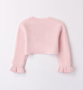 Coprispalle rosa cipria in maglia per bambina con dettagli floreali e bordo smerlato.