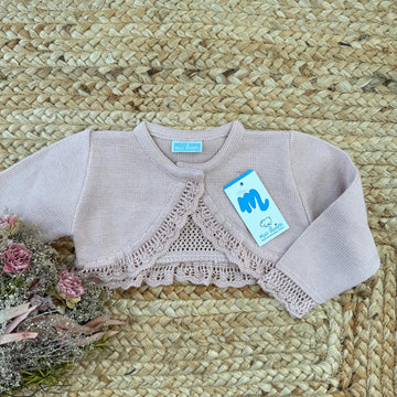 Coprispalle neonata rosa cipria con lavorazione traforata frontale