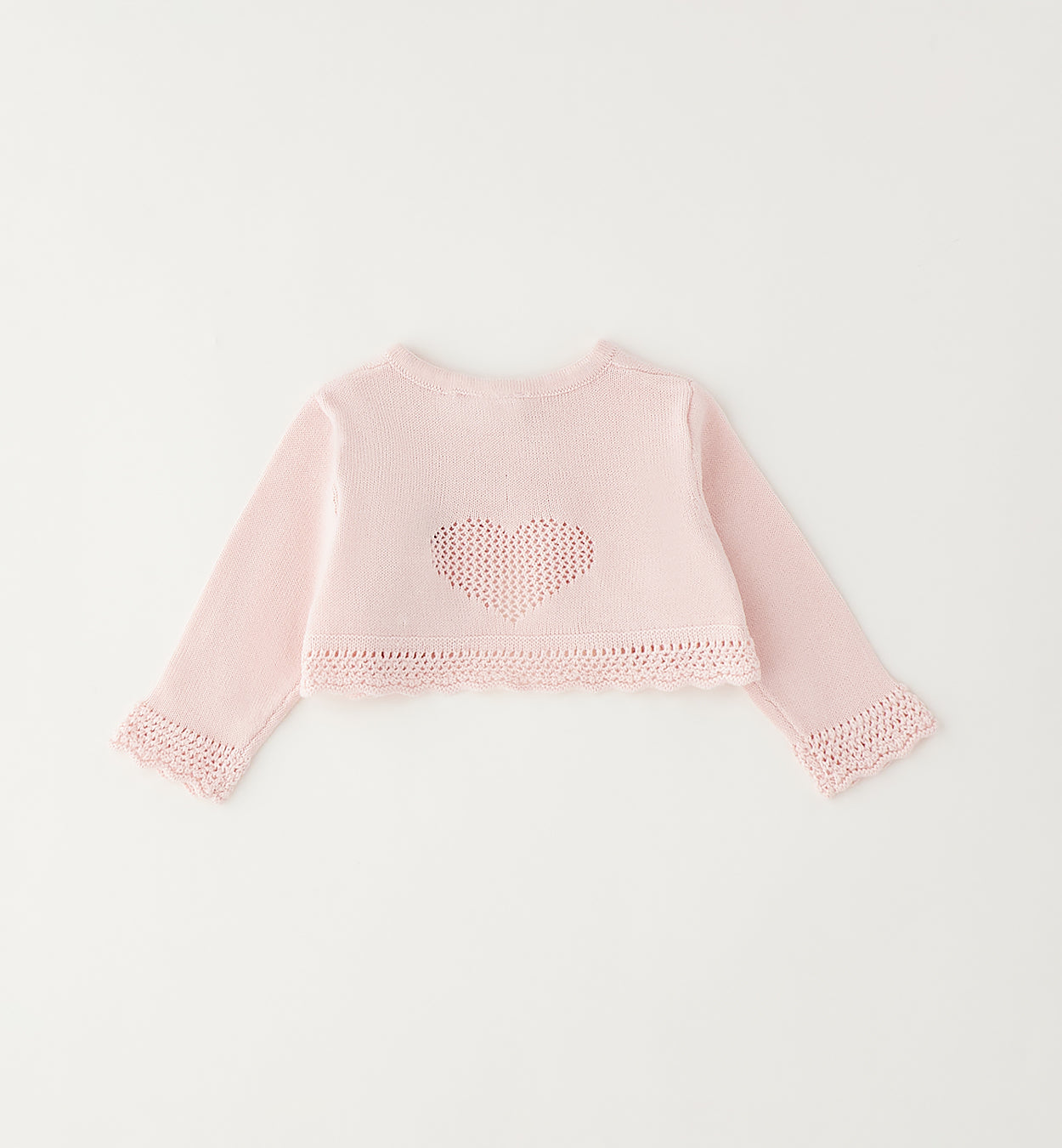 Coprispalle neonata rosa vista retro con cuore traforato