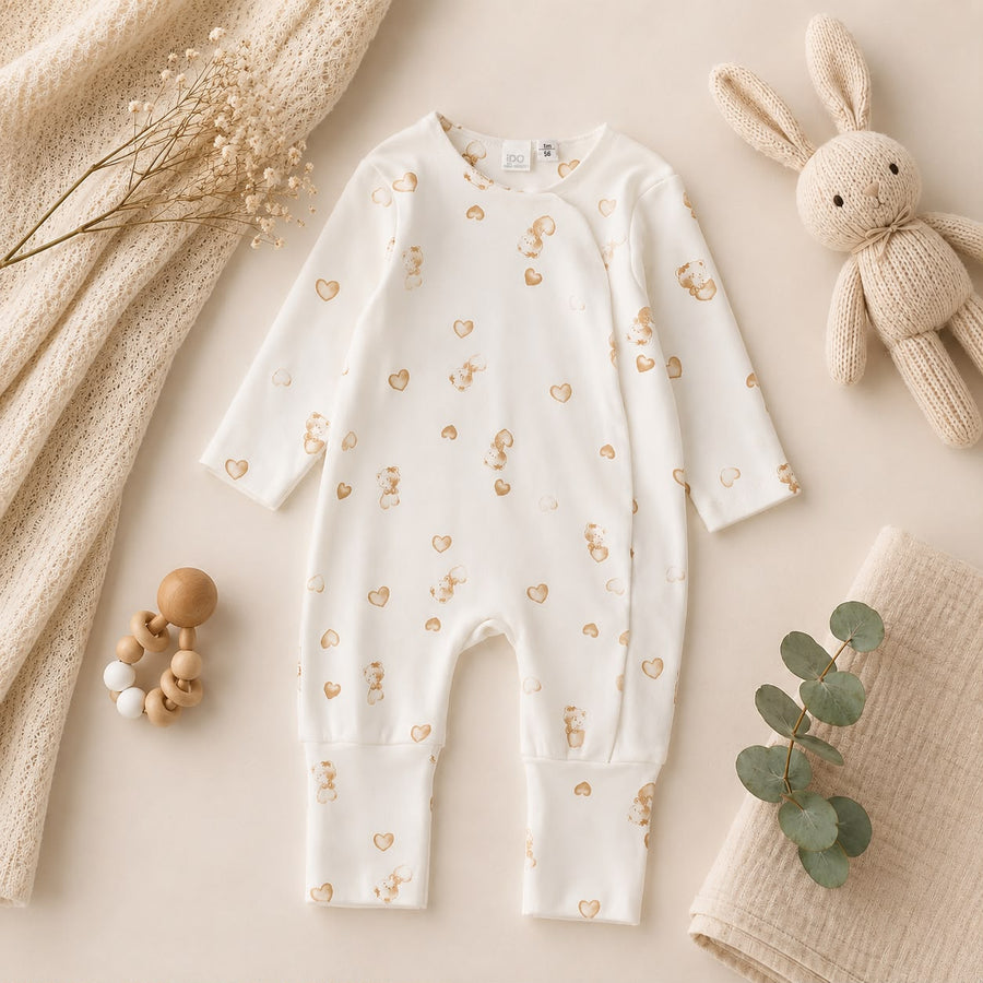 Tutina neonata in caldo cotone panna con orsetti e cuori