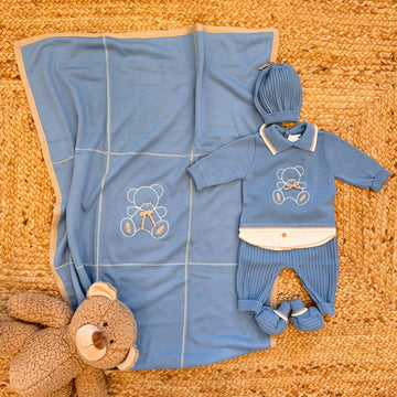 corredino neonato in misto lana azzurro con copertina e accessori