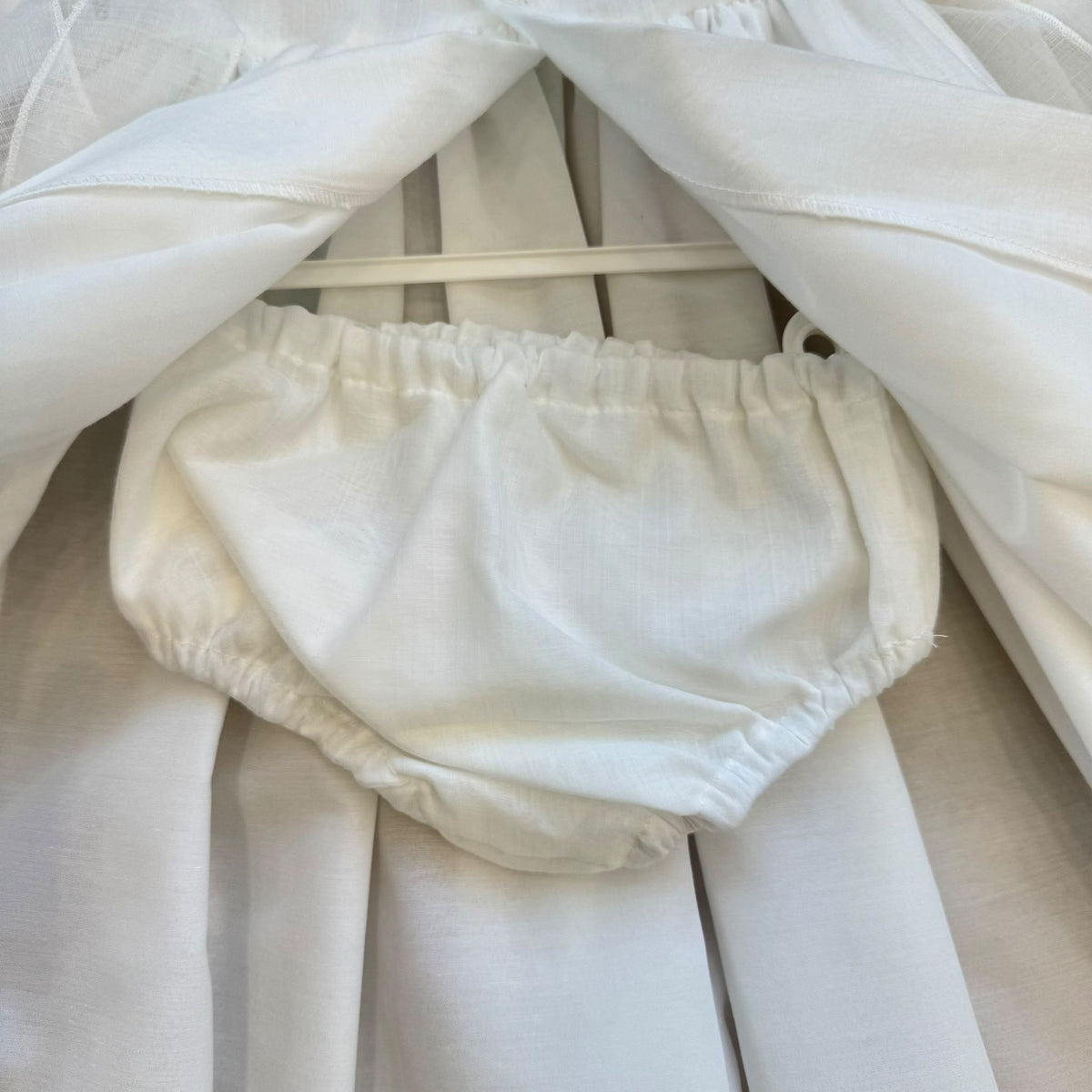Abito battesimo bimba lungo bianco avorio con smock