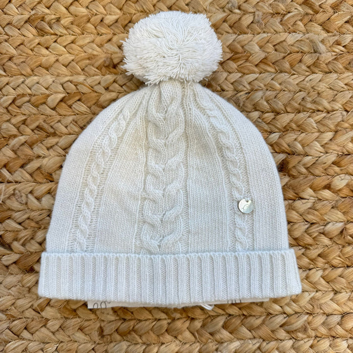 Cappellino neonato panna con trecce e pon pon