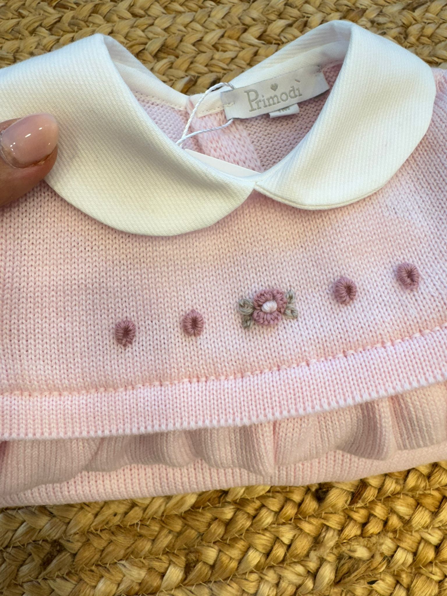 Uscita clinica neonata lana rosa con ricami floreali