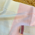 Copertina neonata in pura lana rosa, latte e beige con coordinato nascita Made in Italy.