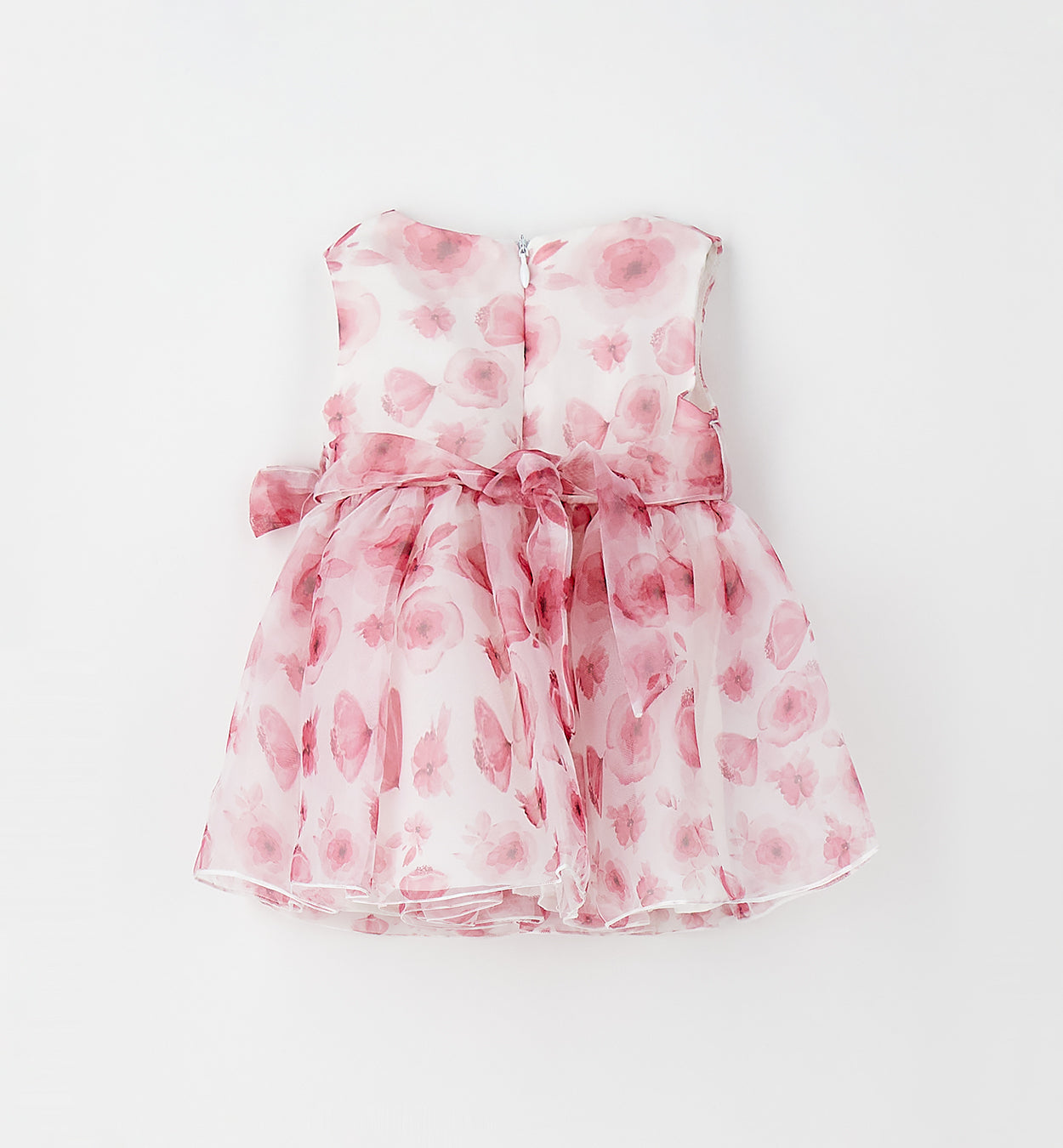 Dettaglio abito bimba floreale rosa con corpino smanicato e gonna vaporosa